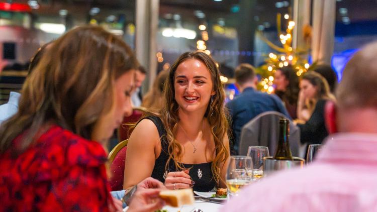 Woman enjoying Christmas party at the Eden Project